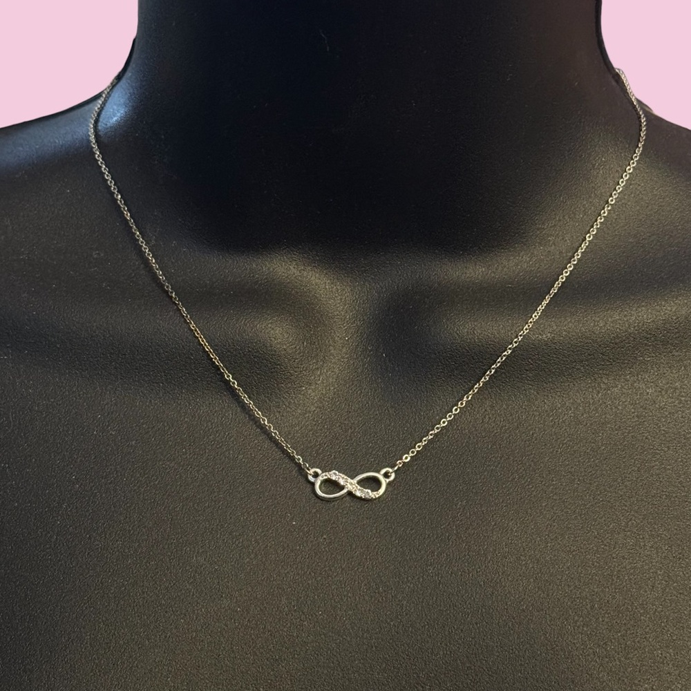 Dainty silver tone infinity necklace
